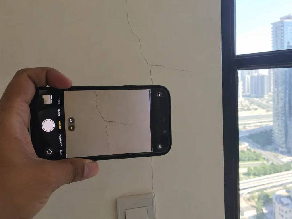 Security deposit back in Dubai documenting wall condition