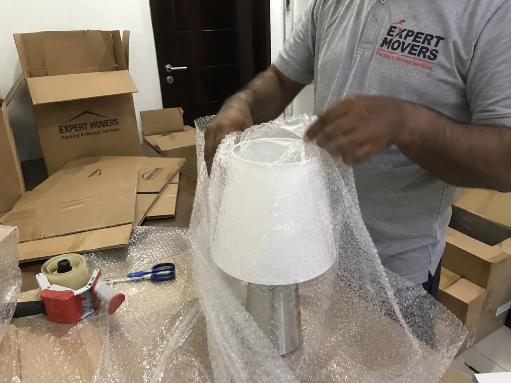 Villa moving cost Dubai packing furniture and fragile items
